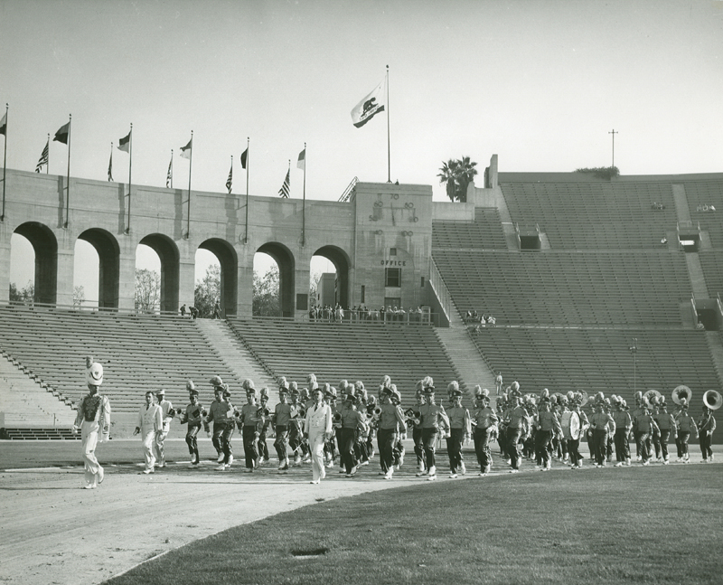 Band marching in Coliseum, 1950's