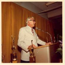 Kelly James at Clarence Sawhill's retirement, 1972