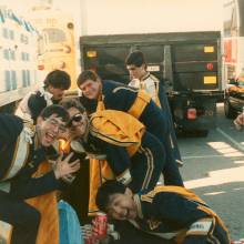Drum Major Tim Close waiting for someone to hand him a Coke, 1980's