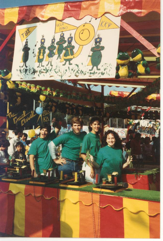 Larry Stern, Shawn Benham, Valda Vitols and Sarah Weinstein running the Mardi Gras Band Booth, mid 1980's