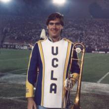 Trombonist John McGinnis models his old uniform, 1996 Band Alumni Reunion