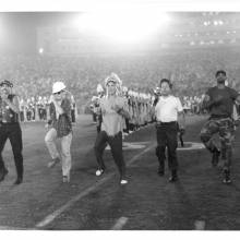 Band members as the Village People, Disco Show, Washington game, October 16, 1993