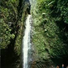 Band members at the Sacred Falls waterfall