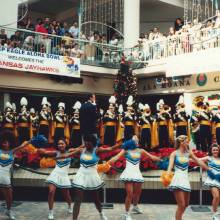 Performing with the Dance Team at the first of two rallies downtown. After this rally, the Band ditched the full uniforms for aloha shirts. December 1995