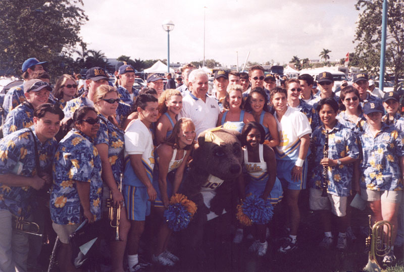 Chancellor Al Carnesale with Band members and the Spirit Squad before the infamous Miami game, December 5, 1998