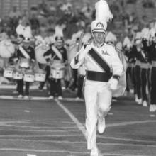 Drum Major Jason Lewis during run-on, 1999