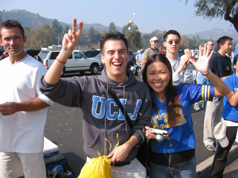 Band alum Rob Scholz cheering as the Band marches in