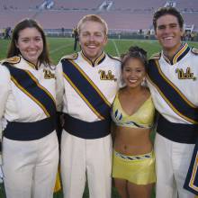 Drum Majors Laura Montoya, Jay Dillon and Michael Froeberg with Golden Girl Veena Goel, 2002-2003
