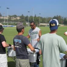 Ralph Hardimon with the snares as Ercan Erhan looks on