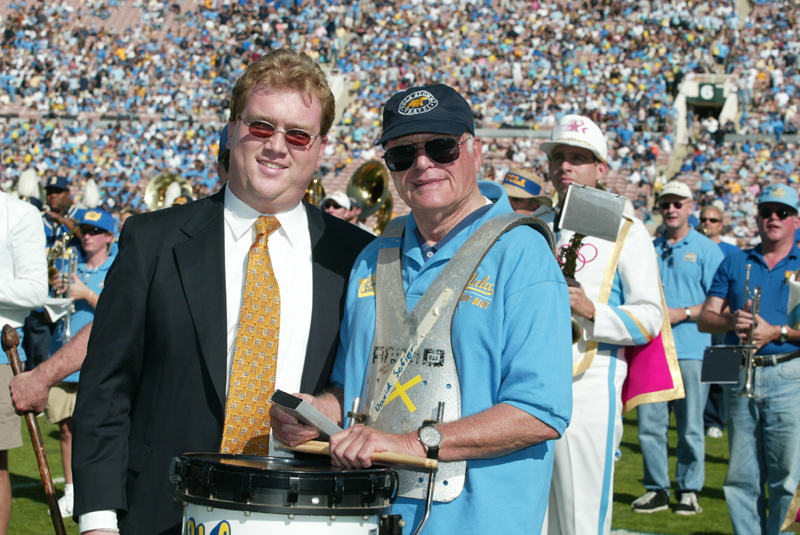 TA Robert Milford presenting Albert Hook with the award for representing the earliest UCLA class (1949) at the Band Alumni Reunion