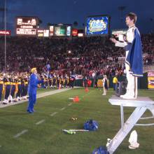 Drum Major Dan Thomson conducting the postgame concert, USC game, December 4, 2004