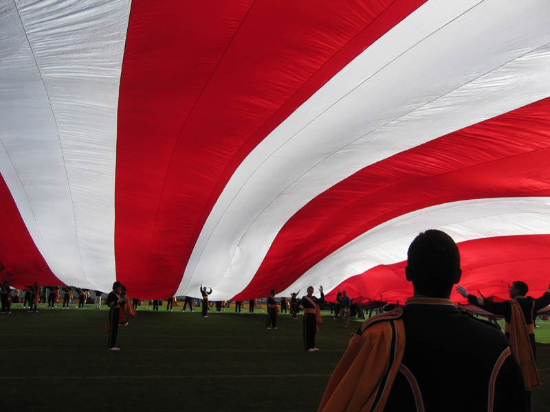 Holding up the giant U.S. Flag