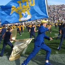 Band Juggler Chris Smith with flag, Halftime at Notre Dame, October 21, 2006