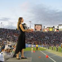 Irene conducting Chorus, Oregon State game, November 11, 2006