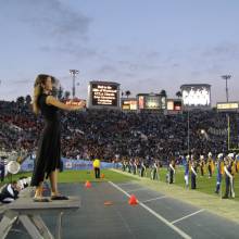 Irene conducting Chorus, Oregon State game, November 11, 2006