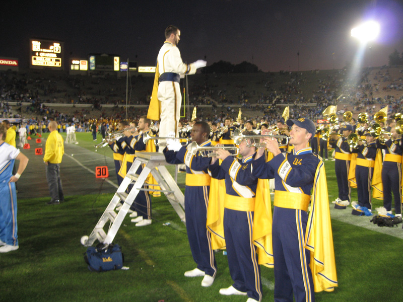 Drum Major Dan Thomson with trumpets, USC game, December 2, 2006