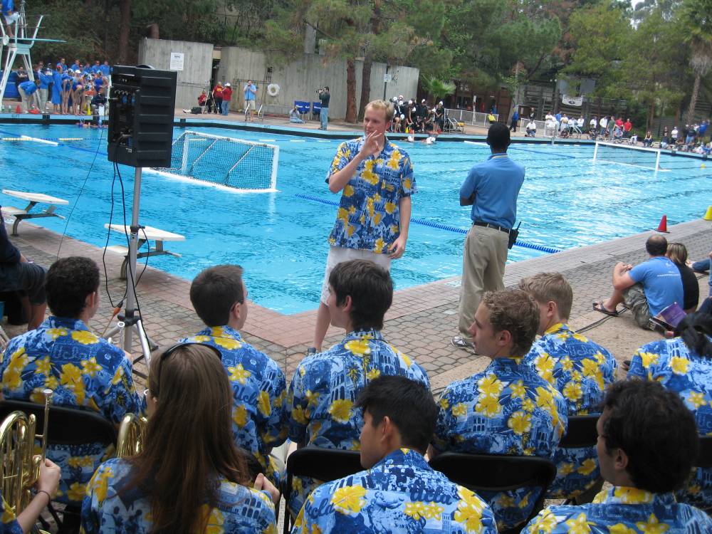 Women's Water Polo with Drum Major Sean Garnreiter conducting