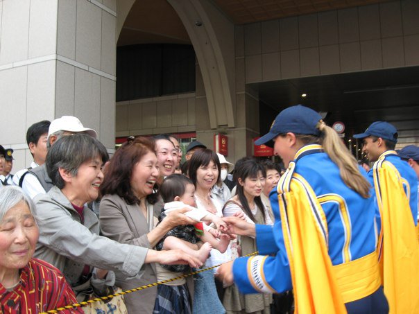 Greeting fans at the Festival Parade