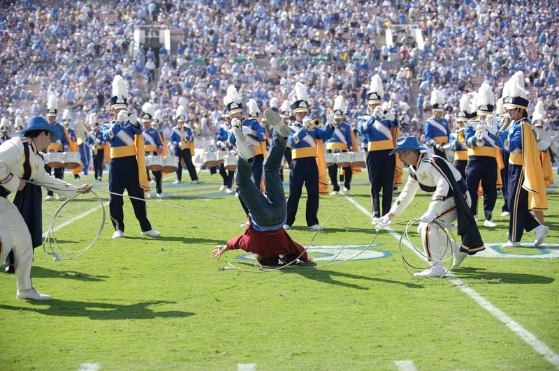 Drum Majors lassoing a Trojan, Western Show, Oregon game, October 10, 2009