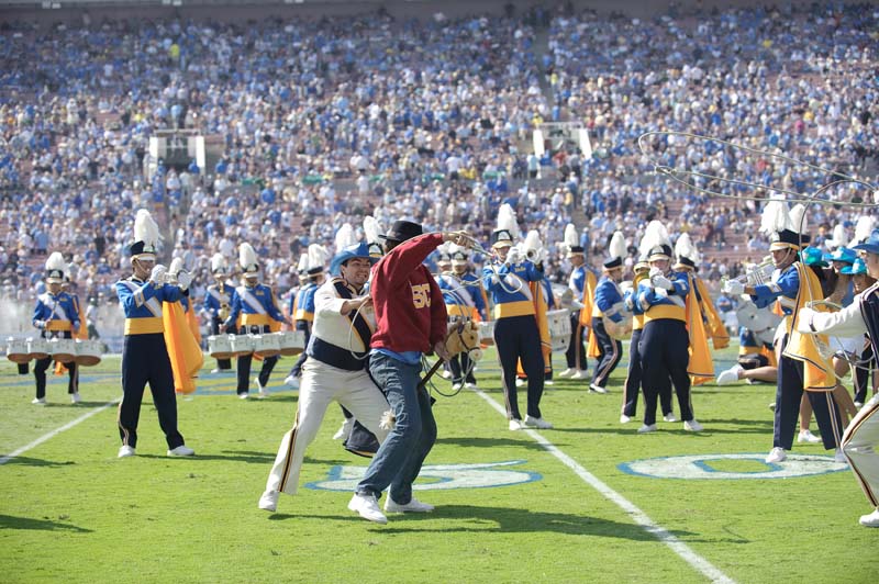 Drum Majors lassoing a Trojan, Western Show, Oregon game, October 10, 2009