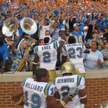 Team celebrates with fans after game, September 12, 2009