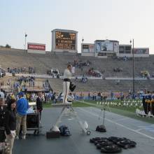 Drum Major Kent Heberer conducting at Postgame