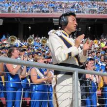 Drum Major Andrew Ge in the stands at Stanford, October 3, 2009