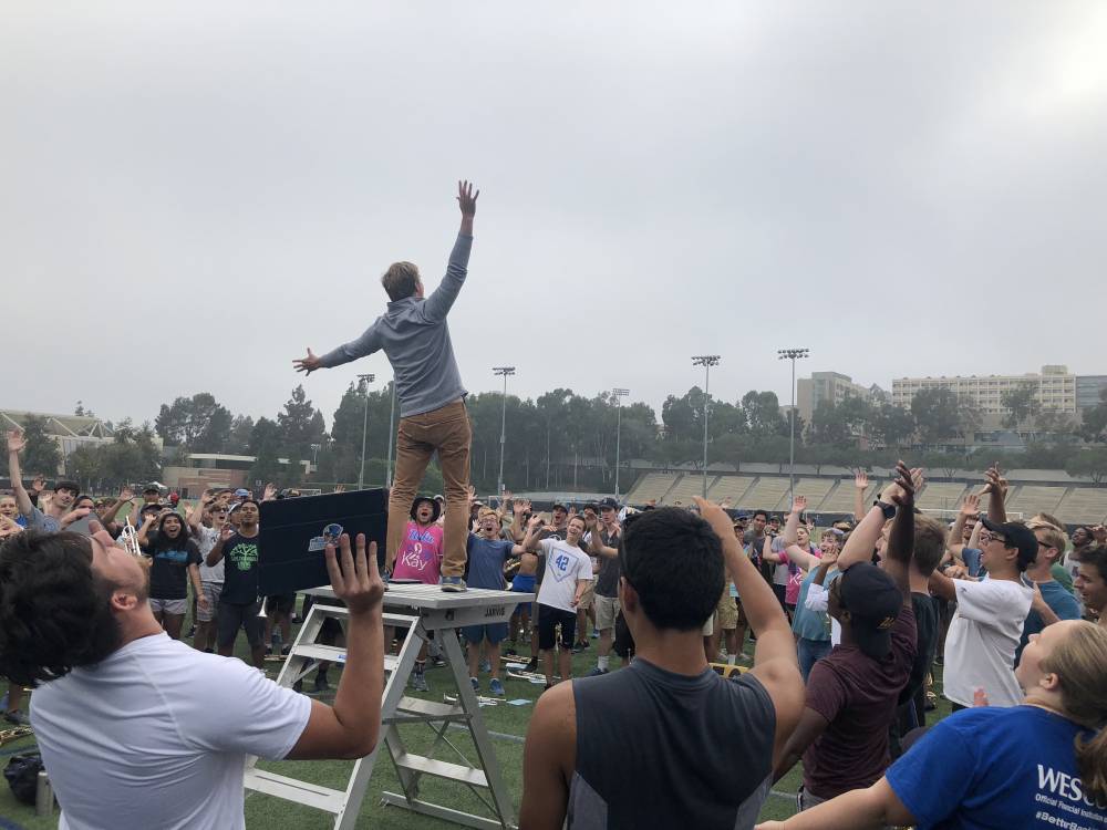 Marching Clinician Charlie Hall leads the 8 Clap