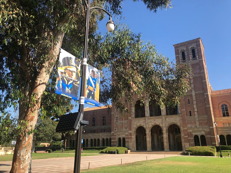 Flute and Bass Drum Banner in front of Royce Hall