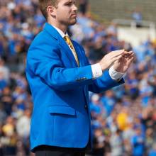 TA Tyler Farrell conducting the National Anthem