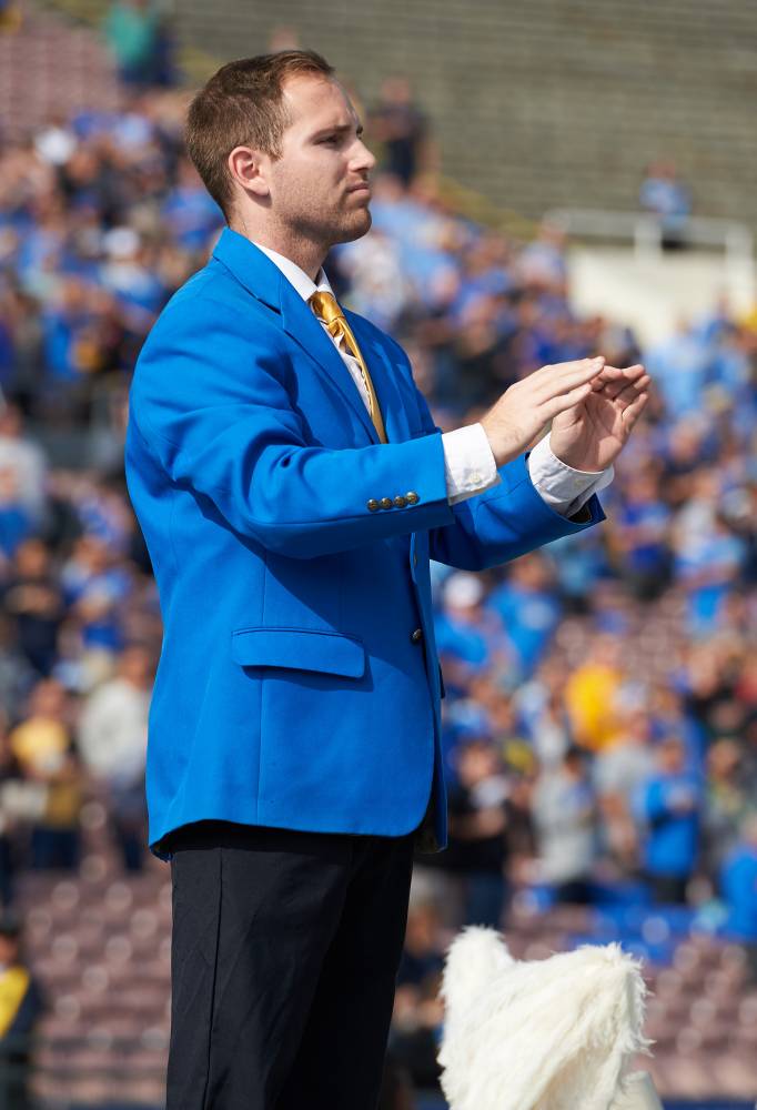 TA Tyler Farrell conducting the National Anthem