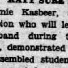 Mascot Drum Major Jimmie Kasbeer leads band, September 28, 1937