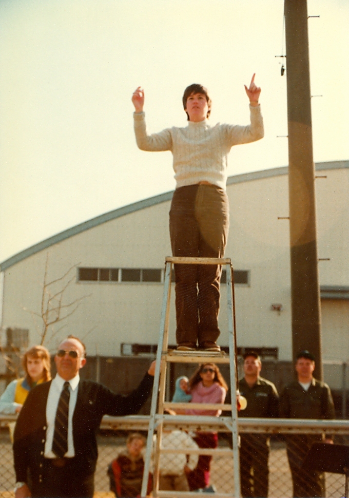 Jennifer Judkins Conducting on Ladder