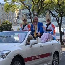 After the performance, the Band takes a curtain call with Director Gordon Henderson in the lead car