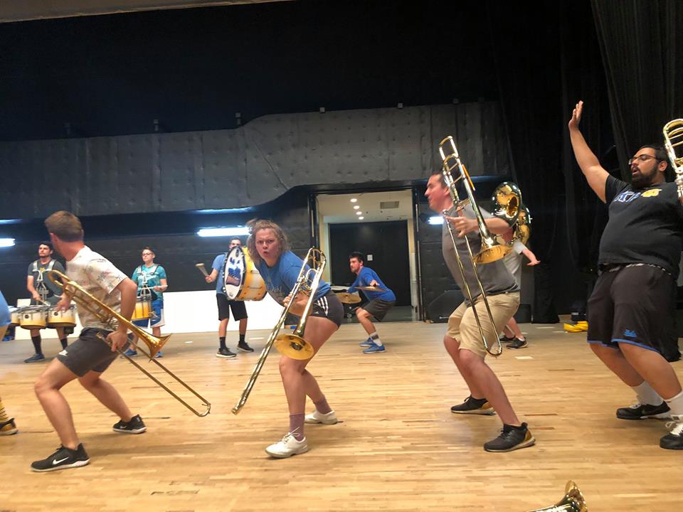 Trombonists Simon Kapler, Lily Krol, Chris Routh and Sukhi Bassi rehearsing "Wipeout" at the Winc Theater