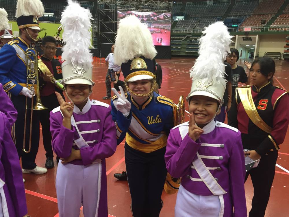 Lily Krol with members of the Suranaree Band from Thailand