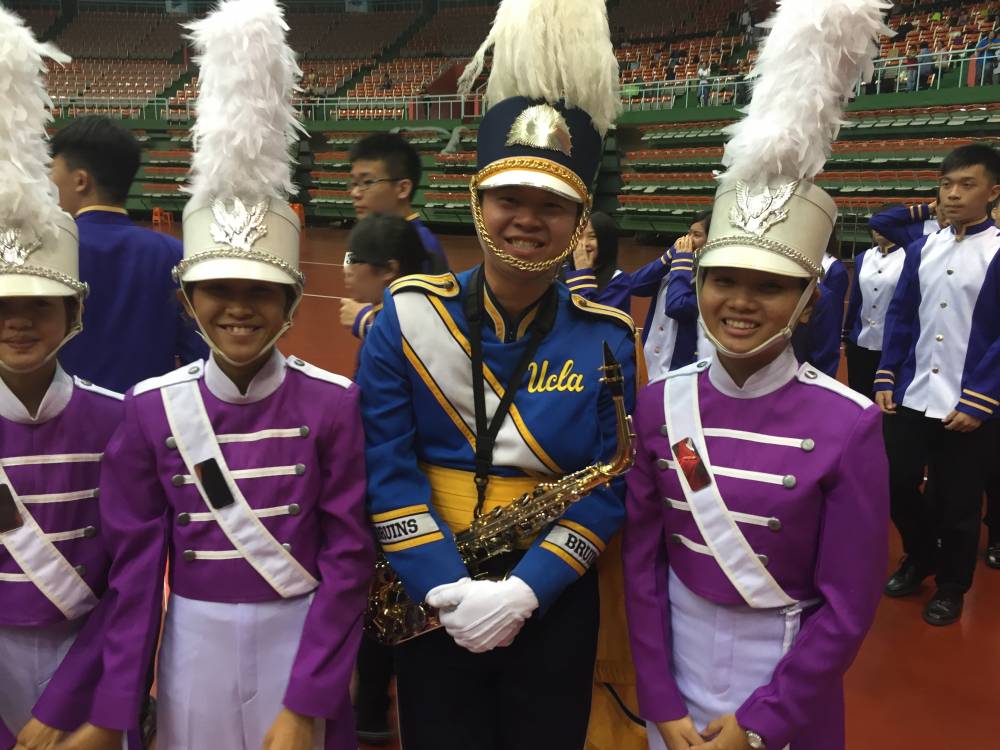 Justin Sun with members of the Suranaree Band from Thailand